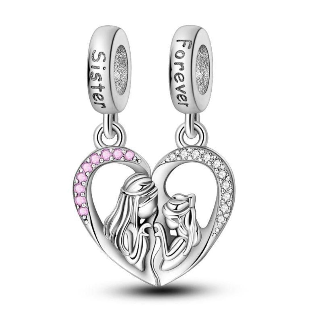 Heart-shaped silver charm with 'Sister' and 'Forever' text, pink accent, and two women silhouette on a white background.